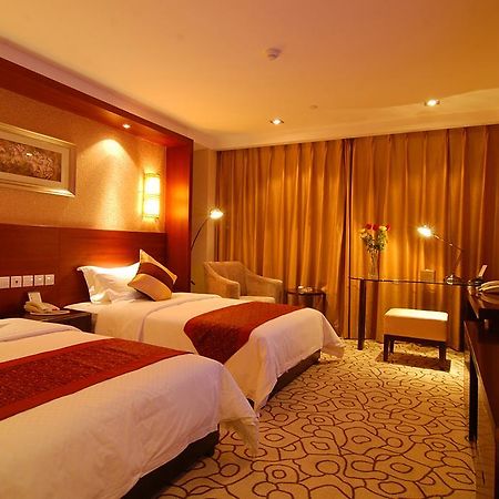 Dynasty International Hotel Kunming Zimmer foto