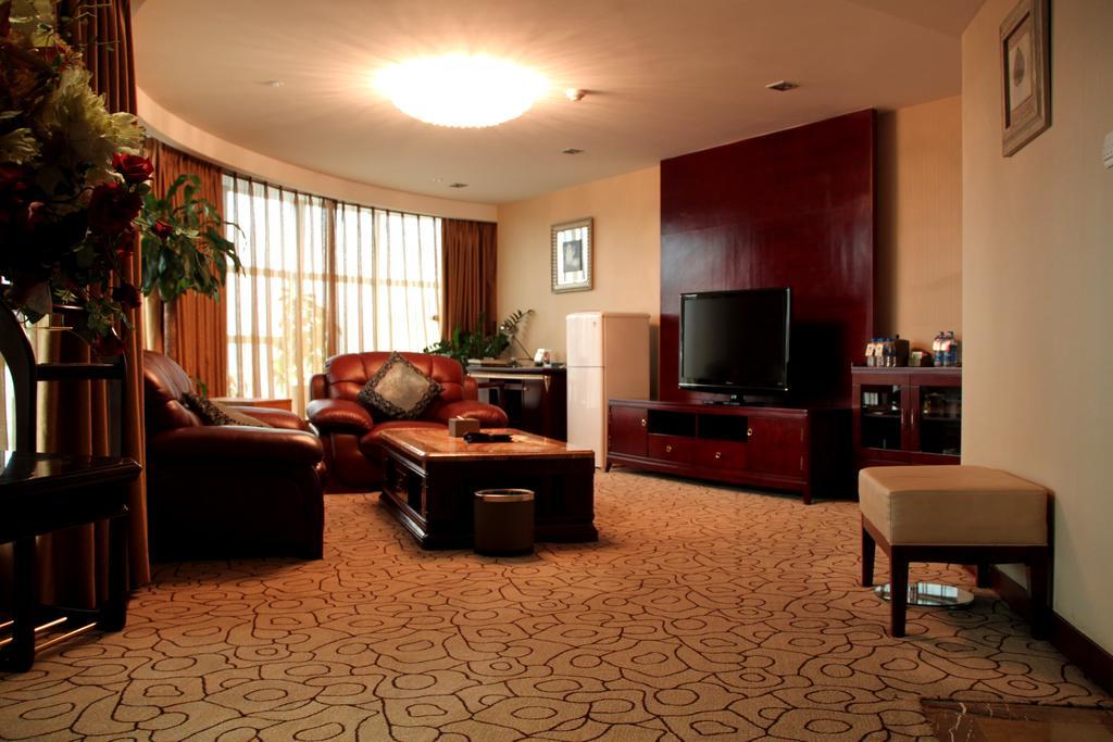 Dynasty International Hotel Kunming Zimmer foto